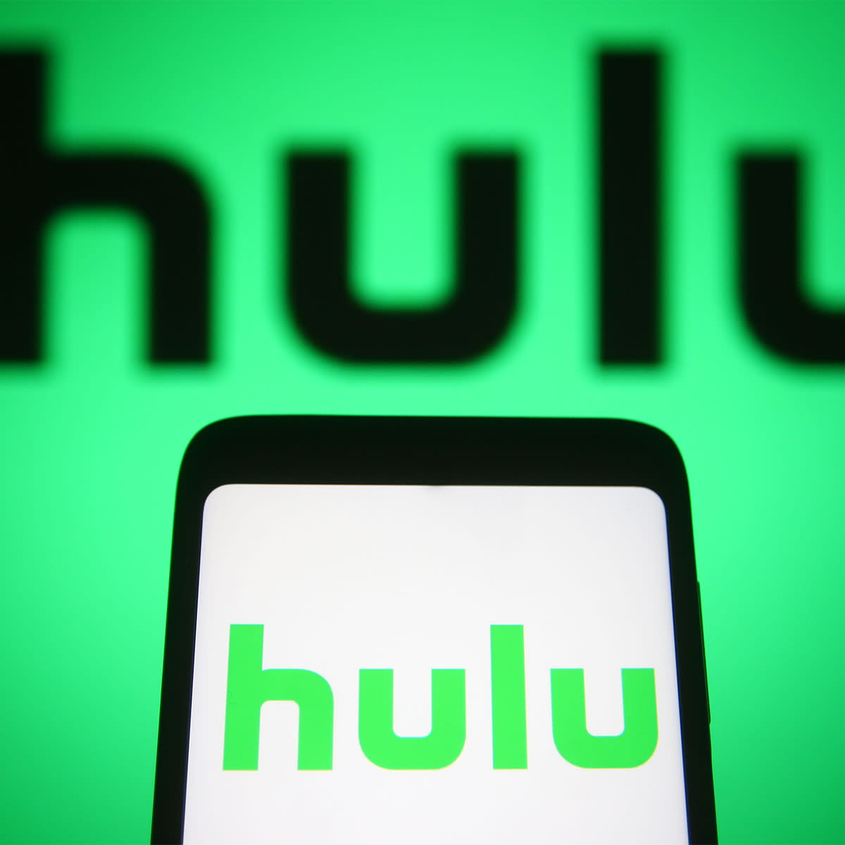 Hulu app logo and on a phone