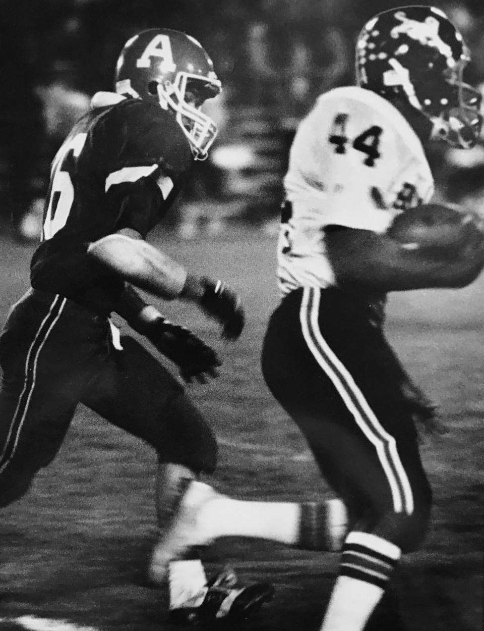 North Central's all-state candidate Lars Tate sprints 30 yards to set up the Panthers' final TD in a 34-8 victory over Anderson in 1983. Tate scored twice with a 93-yard run in the opening quarter and led rushing stats with 175 yards.