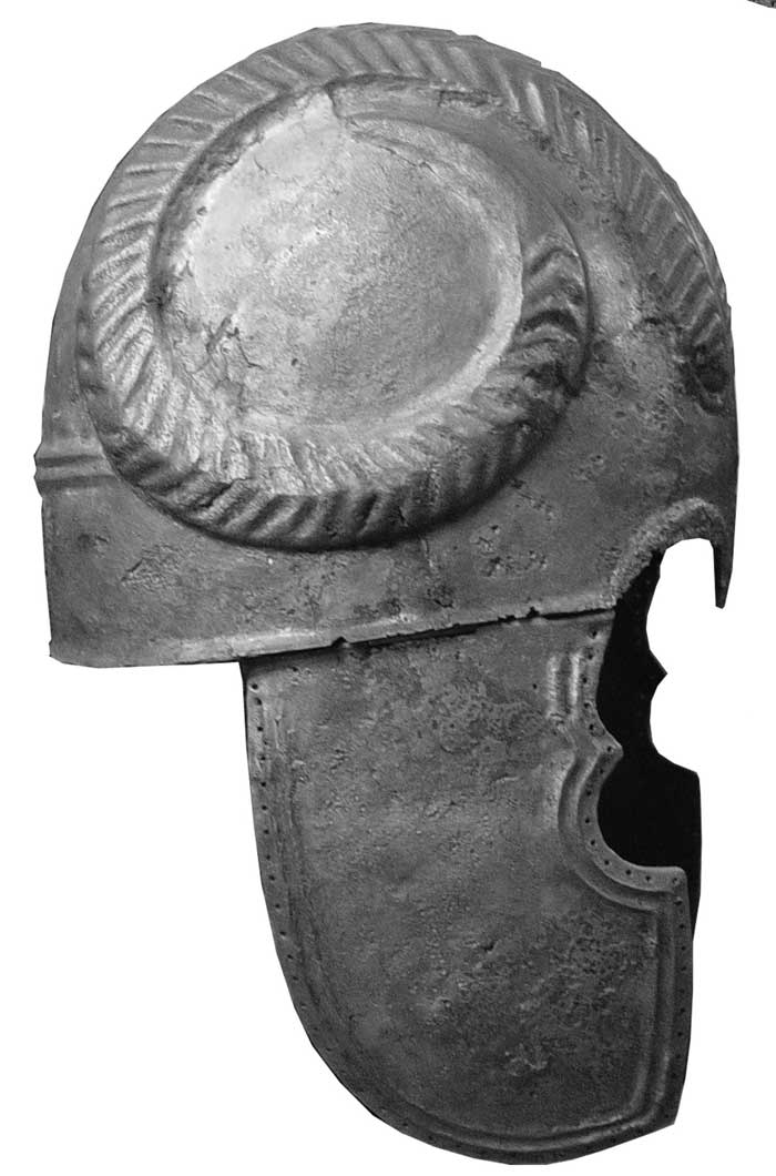 This bronze helmet, found on the surface of the necropolis, depicts curled sheep horns carved in high relief. (Photo courtesy Valentina Mordvintseva) <br> <br> <a href="http://www.livescience.com/27271-ancient-treasure-caucasus.html" rel="nofollow noopener" target="_blank" data-ylk="slk:Click here to see the full collection at LiveScience.com;elm:context_link;itc:0;sec:content-canvas" class="link ">Click here to see the full collection at LiveScience.com</a>