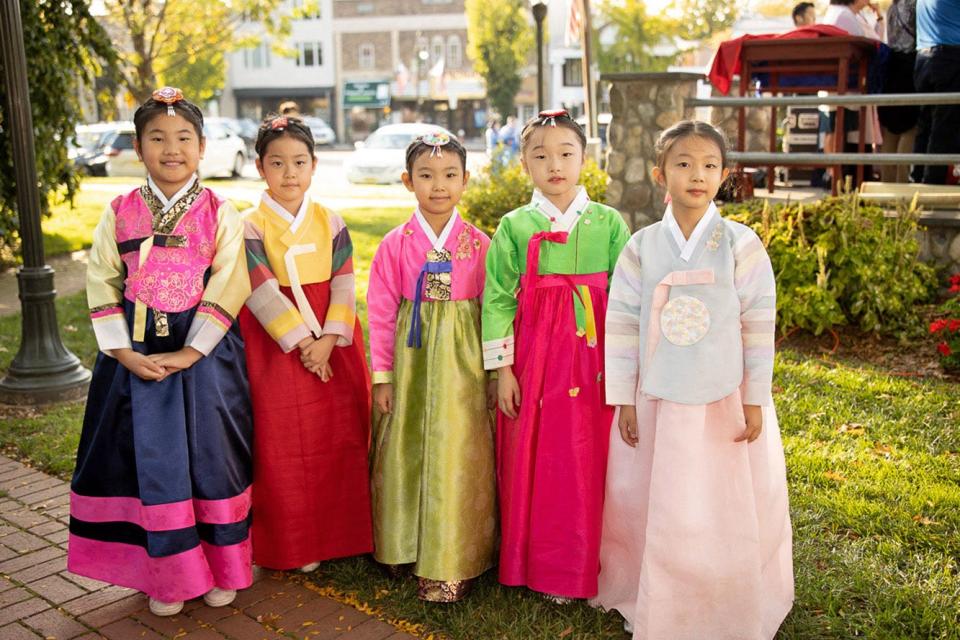 Deborah, Sophia, Joann, Rachel, Chloe  show off there Dresses at the first festival celebrating Hanbok Day a Korean festival, Thursday, October 21, 2021.