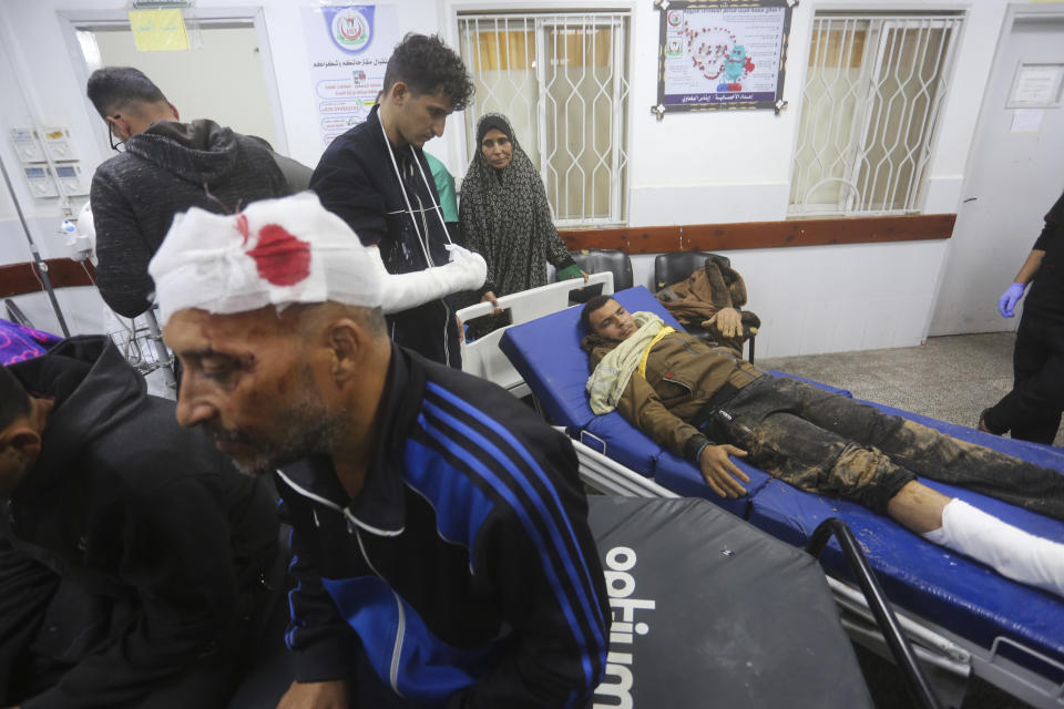 Palestinians wounded in tyhe Irsaeli bombardment of the Gaza Strip arrive to a hospital in Rafah on Wednesday, Dec. 13, 2023. (AP Photo/Hatem Ali)