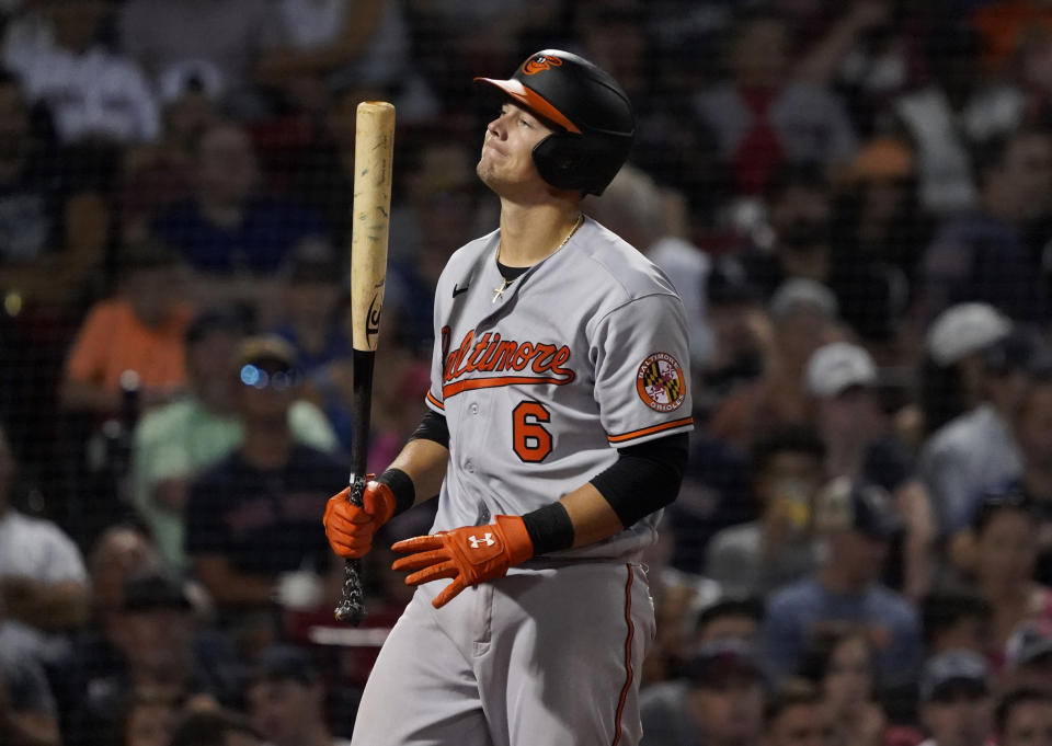 Baltimore Orioles' Ryan Mountcastle (6) reacts after striking out during the eighth inning of the team's baseball game against the Boston Red Sox at Fenway Park, Thursday, Aug. 11, 2022, in Boston. (AP Photo/Mary Schwalm)