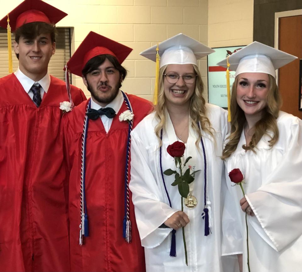 From left, Jonathan Powell, Oliver Sigouin, Carly Turgeon, and Lillian Roux are all smiles on the night of their graduation from Sanford High School on Wednesday, June 7, 2023.
