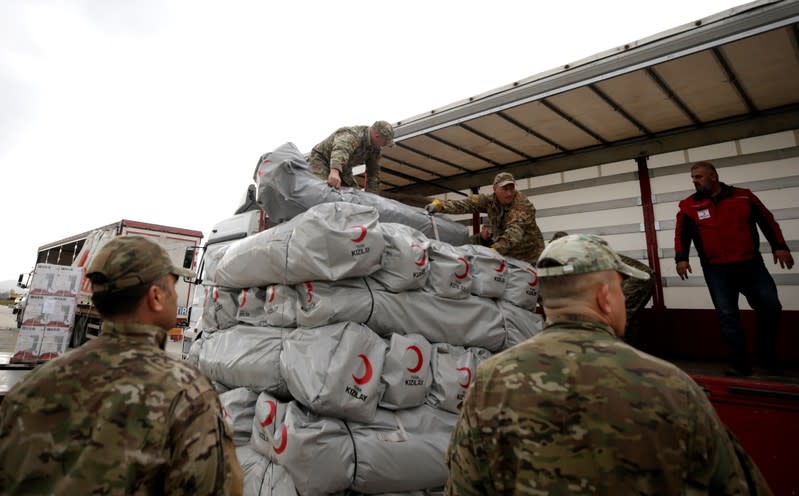 A Turkish plane with aid supplies arrives at Mother Teresa Airport in Tirana