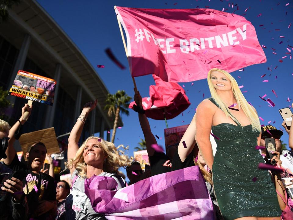 Supporters of the #FreeBritney movement gather outside her Los Angeles conservatorship hearing in November 2021 (Patrick T Fallon/AFP/Getty)