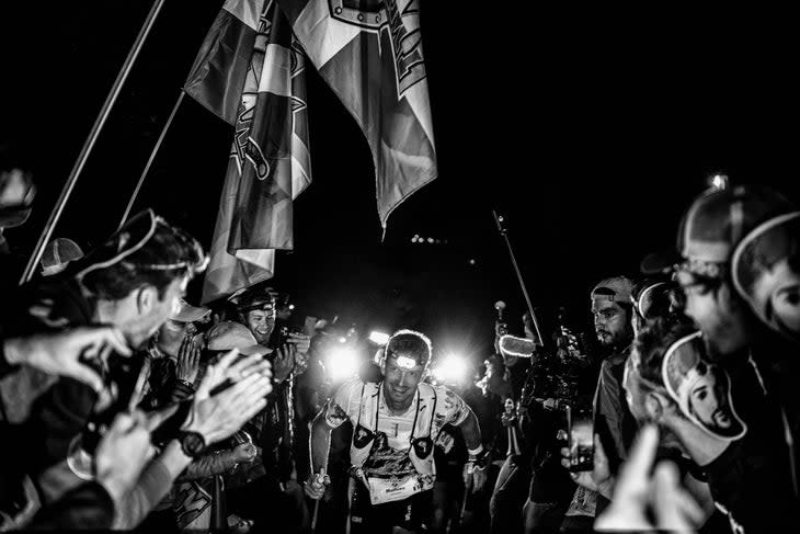 <span class="article__caption">French athlete Mathieu Blanchard competes surrounded by supporters during the 20th edition of The Ultra Trail du Mont Blanc (UTMB), 2023. (Photo: JEFF PACHOUD/AFP/Getty</span>