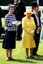<p>For day two of Royal Ascot, the Queen worked a canary yellow ensemble, while her daughter Princess Anne paired a gingham jacket with white gloves and a navy blue skirt. <br><em>[Photo: Getty]</em> </p>