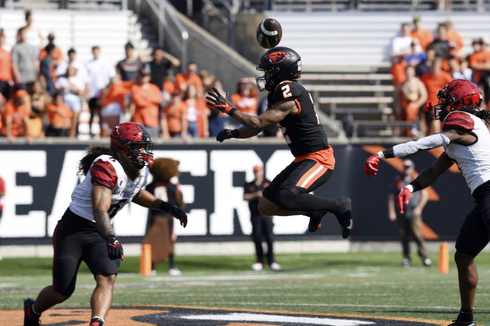 Oregon State wide receiver Anthony Gould (2) tips a pass that is intercepted by San Diego State during the second half of an NCAA college football game Saturday, Sept. 16, 2023, in Corvallis, Ore. Oregon State won 26-9. (AP Photo/Mark Ylen)