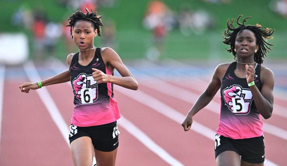 Central’s Mikiyla Royal, left, and Keytonna Ross, right, finish third and second respectively in the 200 at the CIF Central Section Masters track and field meet, held at Veterans Memorial Stadium Saturday, May 20, 2023 in Clovis.