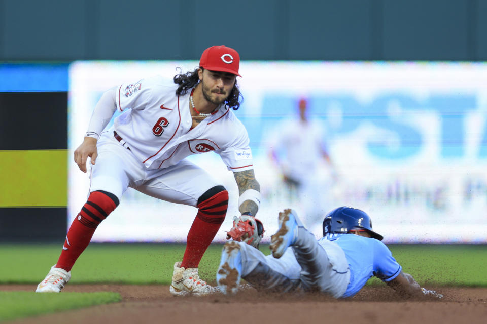 Tampa Bay Rays' Wander Franco, right, is tagged out by Cincinnati Reds' Jonathan India at second on a steal attempt during the fourth inning of a baseball game in Cincinnati, Tuesday, April 18, 2023. (AP Photo/Aaron Doster)