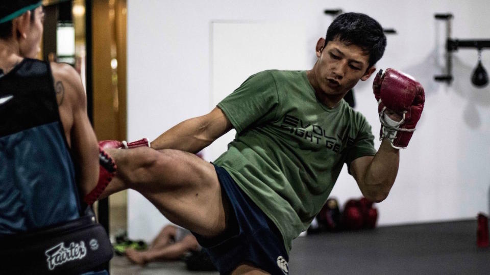 Karate World Champion Hiroki Akimoto training Muay Thai at Evolve MMA in Singapore.