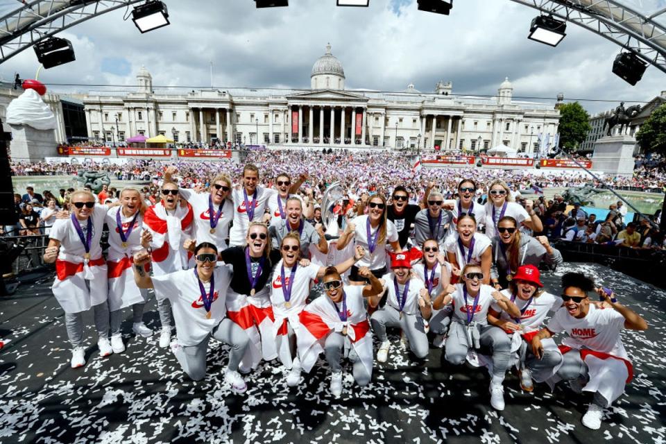 The England team celebrate their Euros win in Trafalgar Square (FA/Getty)