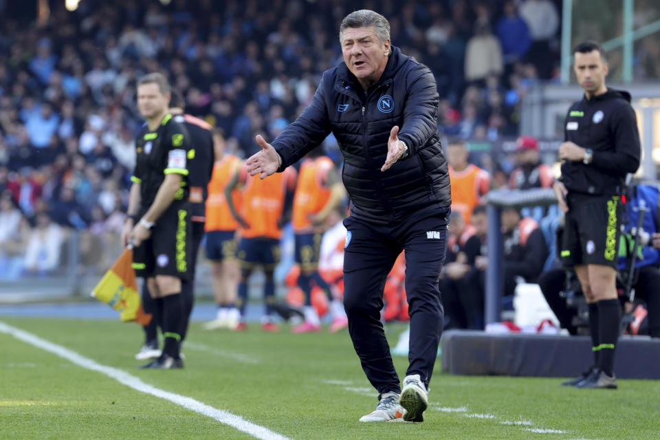 Napoli's head coach Walter Mazzarri reacts during the Serie A soccer match between Napoli and Genoa at the Diego Maradona Stadium in Naples, Italy, Feb. 17, 2024. (Alessandro Garofalo/LaPresse via AP)