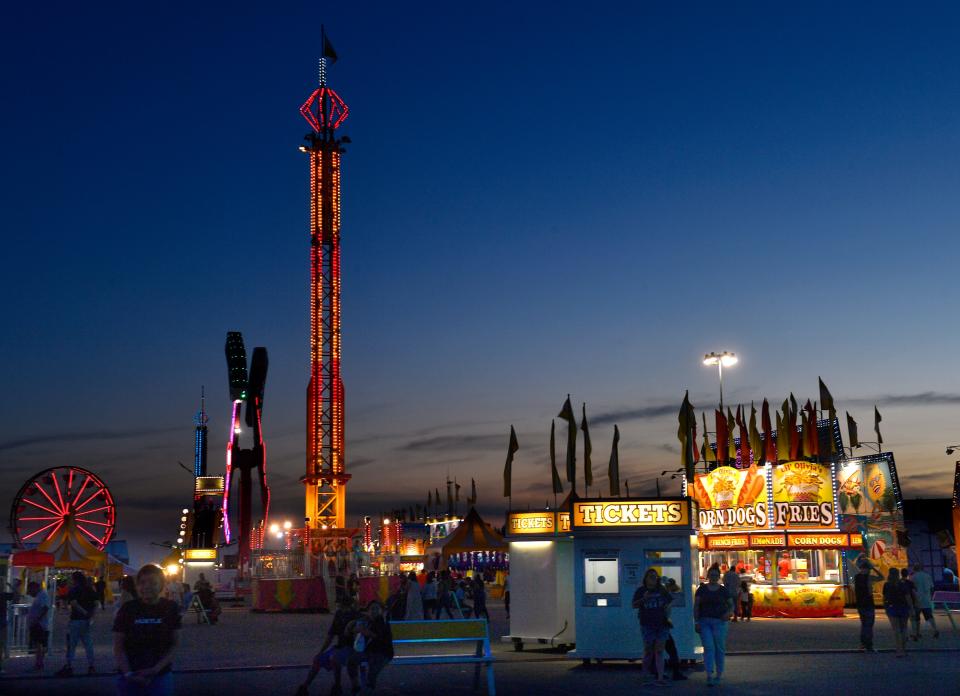 The West Texas Fair & Rodeo carnival against the sunset in Abilene Thursday Sept. 8, 2022.