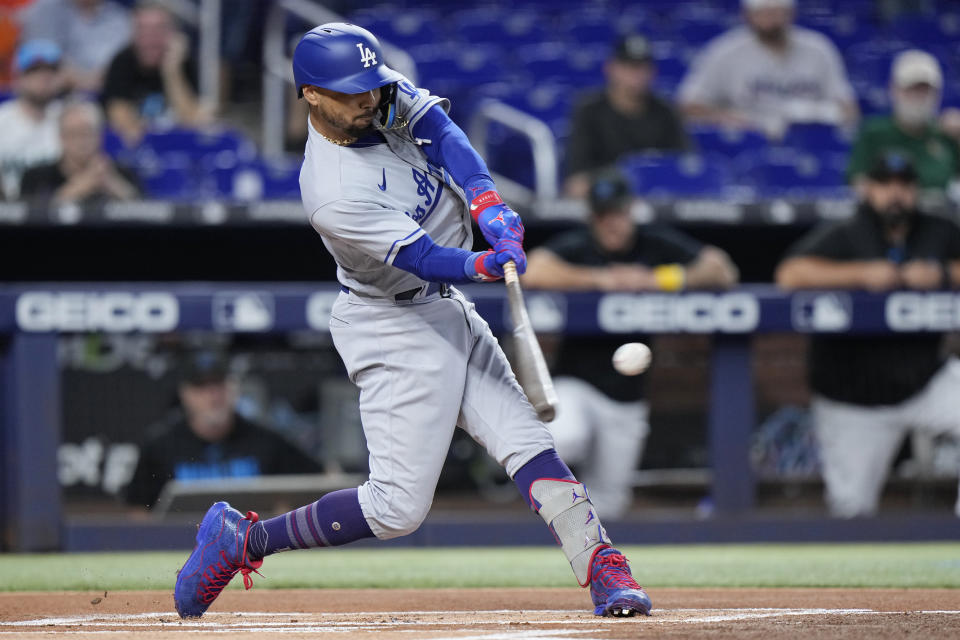 Los Angeles Dodgers' Mookie Betts bats during the first inning of a baseball game against the Miami Marlins, Tuesday, Sept. 5, 2023, in Miami. (AP Photo/Wilfredo Lee)