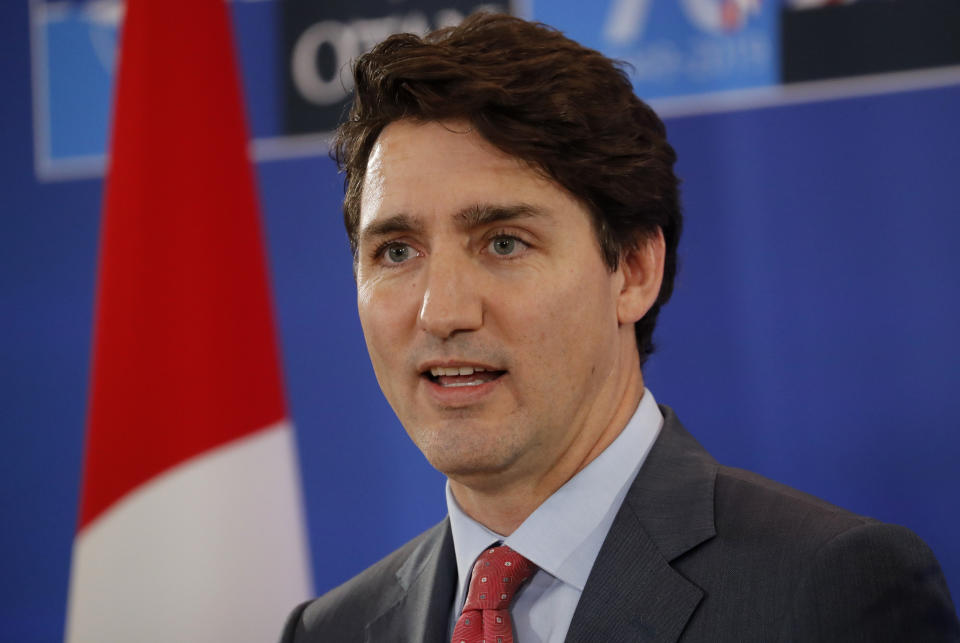 Canadian Prime Minister Justin Trudeau speaks during a media conference at the conclusion of a NATO leaders meeting at The Grove hotel and resort in Watford, Hertfordshire, England, Wednesday, Dec. 4, 2019. NATO leaders papered over their differences Wednesday and vowed to respond as one to an attack on any of the 29 member countries, despite divisions over the priorities of the world's biggest security organization. (AP Photo/Frank Augstein)