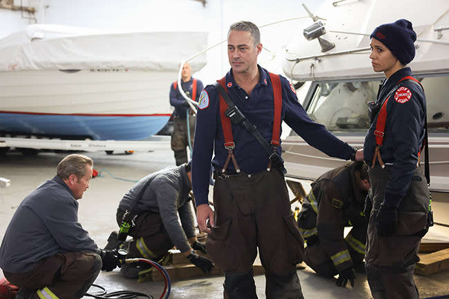 Stella and Kelly stand by boat on Chicago Fire