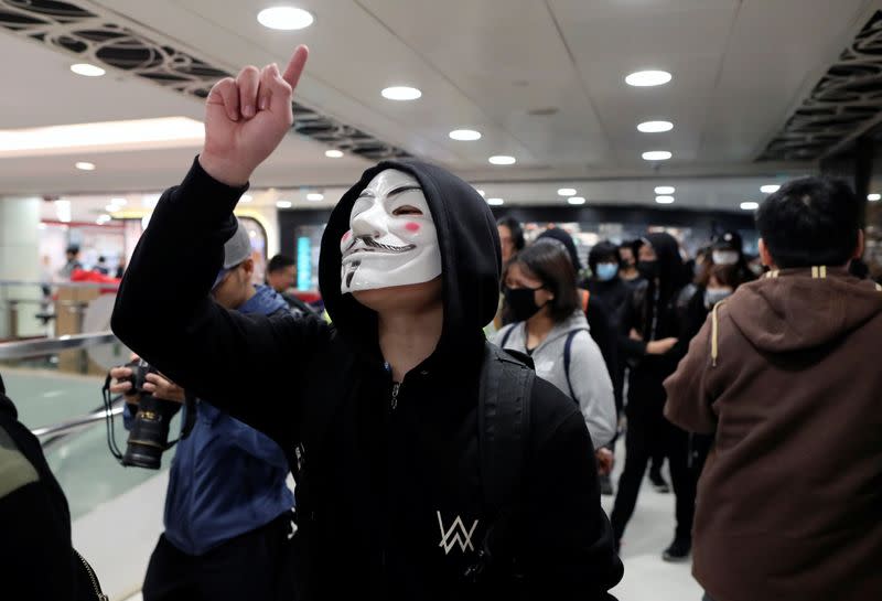 Anti-government demonstrators protest in Sheung Shui shopping mall in Hong Kong