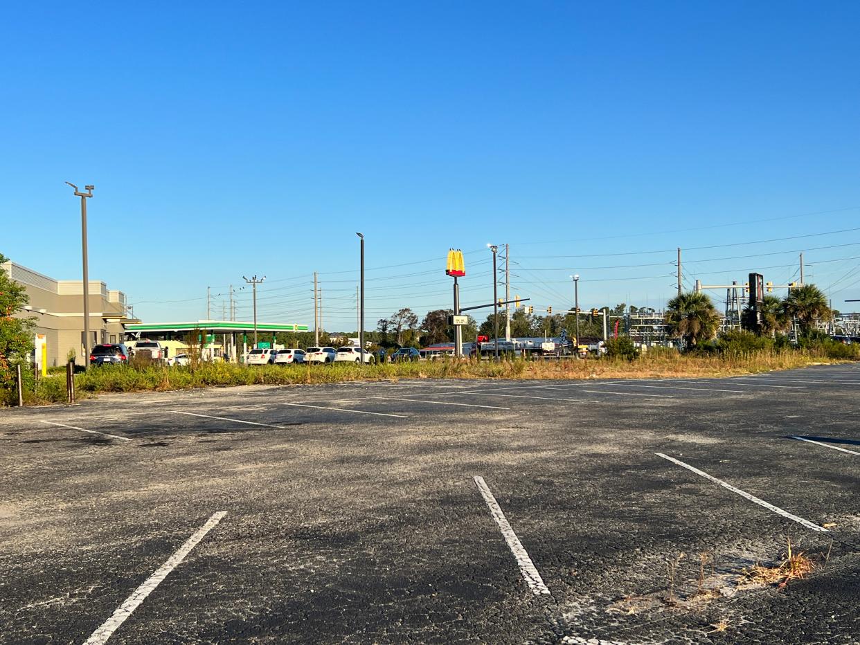 The site at the corner of N.C. 211 and Old Long Beach Road remains on Tuesday, October 10, 2023. The land was sold to an affiliate of Biscuitville last month.