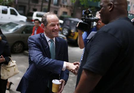 Former New York State Governor and current Democratic candidate for New York City Controller Eliot Spitzer arrives to cast his vote in the Democratic primary election on Manhattan's upper east side in New York, September 10, 2013. REUTERS/Mike Segar