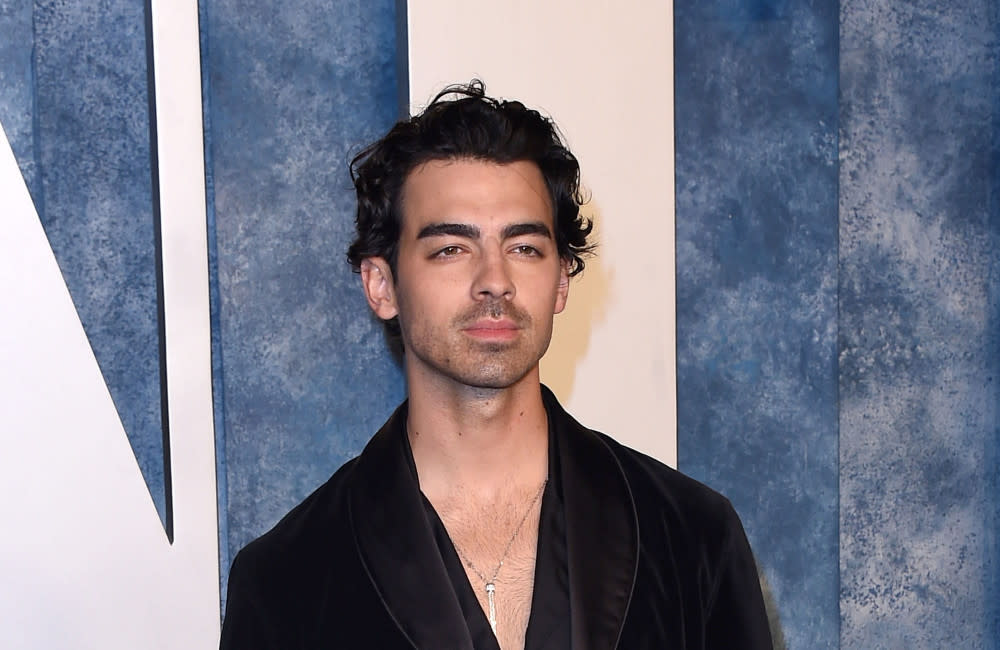 Joe Jonas has never been 'more proud' after finding out his feet are rated highly credit:Bang Showbiz