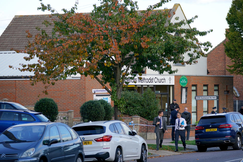 Armed police officers at the scene near the Belfairs Methodist Church in Eastwood Road North, Leigh-on-Sea, Essex, where Conservative MP Sir David Amess has died after he was stabbed several times at a constituency surgery. A man has been arrested and officers are not looking for anyone else. Picture date: Friday October 15, 2021.