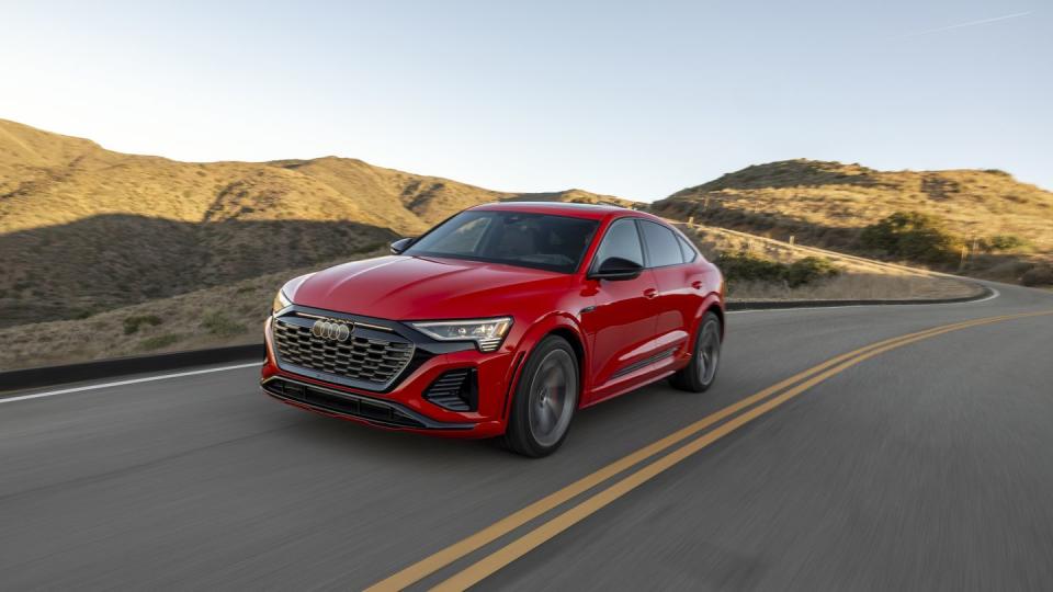 2024 audi sq8 etron sportback red car on winding road