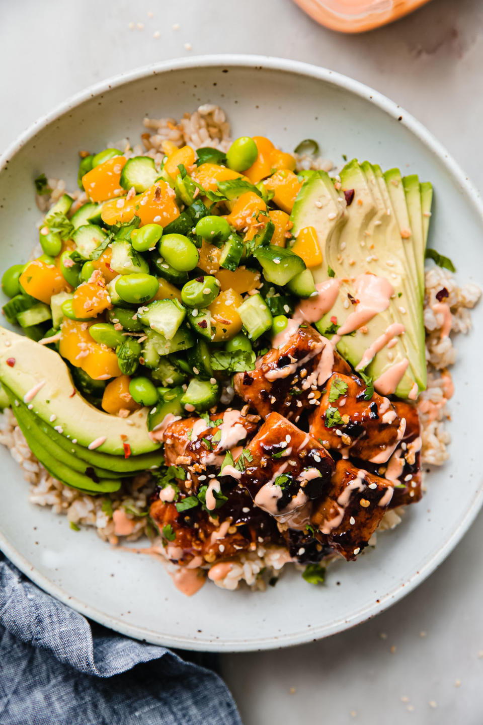 Sweet chili salmon bowl on a bed of rice