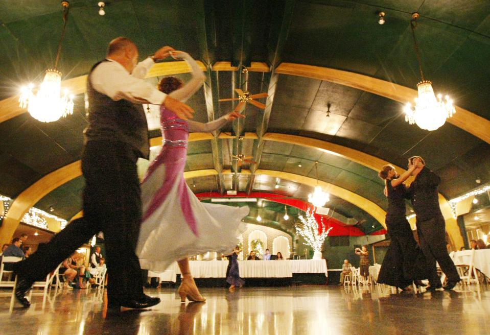 Dancers take the floor at Riverside Ballroom for Green Bay DanceSport's summer showcase and competition in 2009.