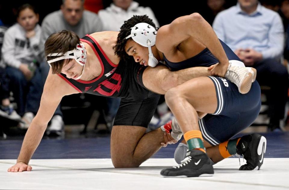 Indiana’s Robert Major can’t get away from Penn State’s Carter Starocci in the 174 lb bout of the match on Sunday, Jan. 14, 2024 at Rec Hall.