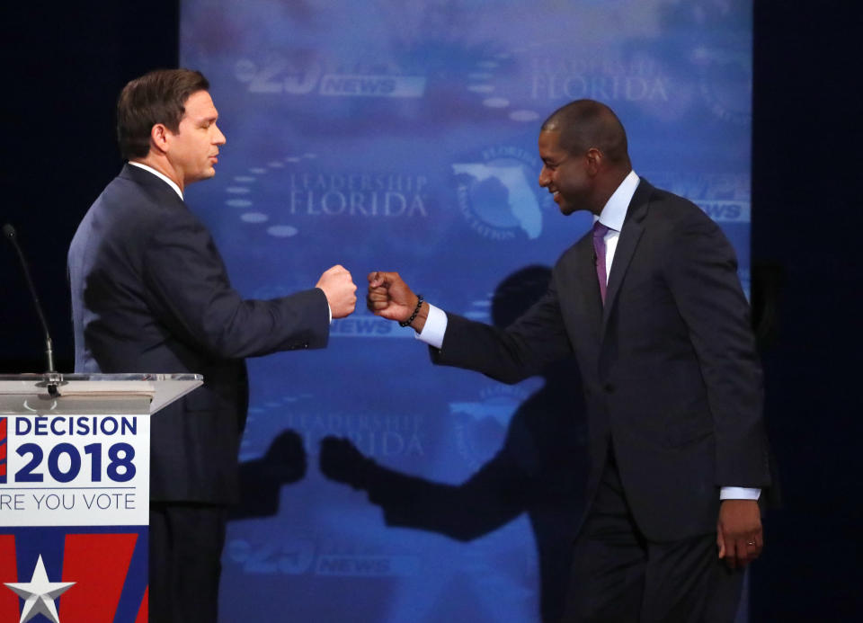 Florida gubernatorial candidates Republican Ron DeSantis, left, and Democrat Andrew Gillum bump fists after a debate on Oct. 24, 2018, at Broward College in Davie, Fla. (AP Photo/Wilfredo Lee, Pool)