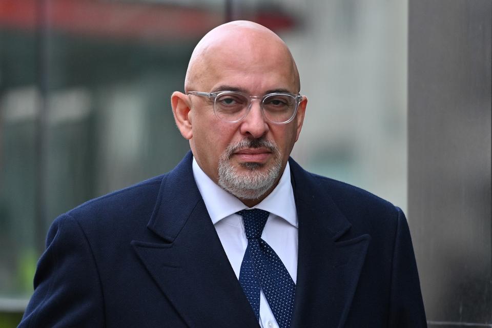 Britain's Parliamentary Under Secretary of State at the Department of Health and Social Care, Nadhim Zahawi, who has responsibility for the deployment of COVID-19 vaccines, reacts as he waks along a street in Westminster in London  on December 2, 2020 as England emerges from a month-long lockdown to combat the spread of Covid-19. - Britain on Wednesday became the first western country to approve a Covid-19 vaccine for general use, announcing a rollout of Pfizer-BioNTech's jab from next week in a major advance for humanity's fightback against the coronavirus. (Photo by JUSTIN TALLIS / AFP) (Photo by JUSTIN TALLIS/AFP via Getty Images)