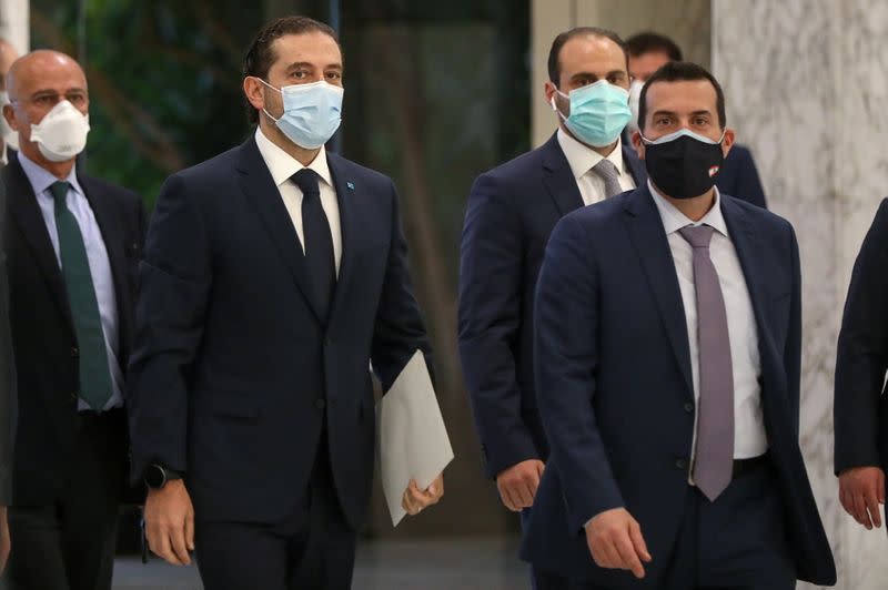 Prime Minister-designate Saad al-Hariri arrives to meet with Lebanon's President Michel Aoun at the presidential palace in Baabda