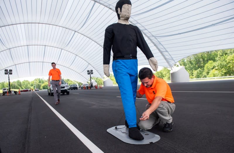 FILE PHOTO: IIHS employees demonstrate pedestrian crash prevention test with Subaru Forester at IIHS-HLDI Vehicle Research Center in Ruckersville, Virginia