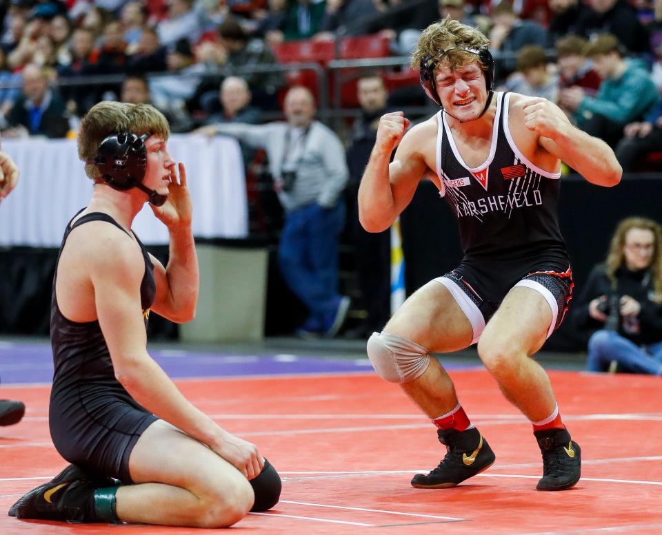 Marshfield's Garrett Willuweit, right, finished in second place in Division 1 at 160 pounds Saturday at the WIAA individual state wrestling tournament at the Kohl Center in Madison.