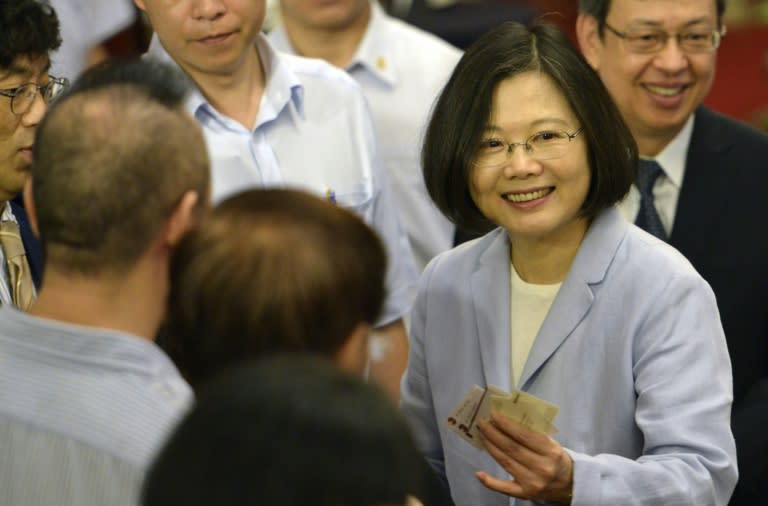 Taiwan President Tsai Ing-wen (R) had a landslide election victory but has struggled in her first few months