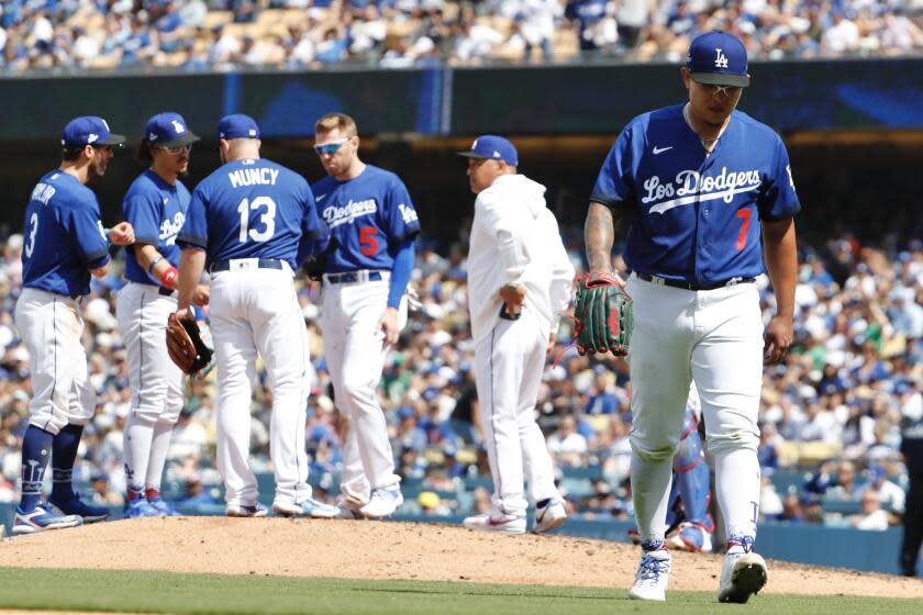 Los Angeles, CA - April 16: Dodgers' Julio Urias walks to the dugout after being taken out of the game.