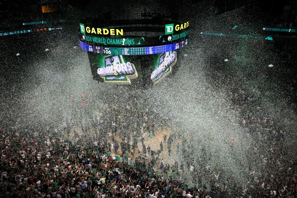 Confetti falls after the Boston Celtics defeated the Dallas Mavericks in Game 5 of the NBA basketball finals, Monday, June 17, 2024, in Boston. (AP Photo/Michael Dwyer)