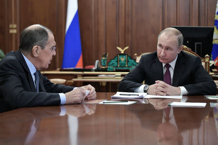 Russian President Vladimir Putin meets with Defence Minister Sergei Shoigu and Foreign Minister Sergei Lavrov at the Kremlin in Moscow, Russia, February 2, 2019. Sputnik/Alexei Nikolsky/Kremlin via REUTERS