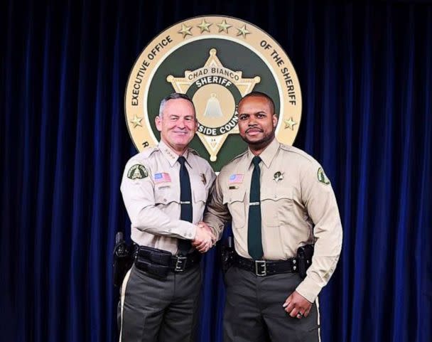 PHOTO: In this undated photo provided by the Riverside County Sheriff, Deputy Darnell Calhoun, right, poses with Riverside County Sheriff Chad Biano, left, in Riverside, Calif. (Riverside County Sheriff via AP)
