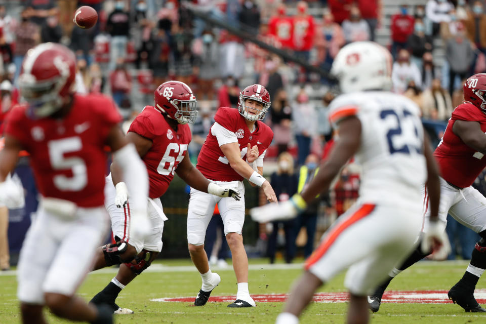 TUSCALOOSA, AL - NOVEMBER 28: Mac Jones #10 of the Alabama Crimson Tide throws a pass against the Auburn Tigers at Bryant-Denny Stadium on November 28, 2020 in Tuscaloosa, Alabama. (Photo by UA Athletics/Collegiate Images/Getty Images)