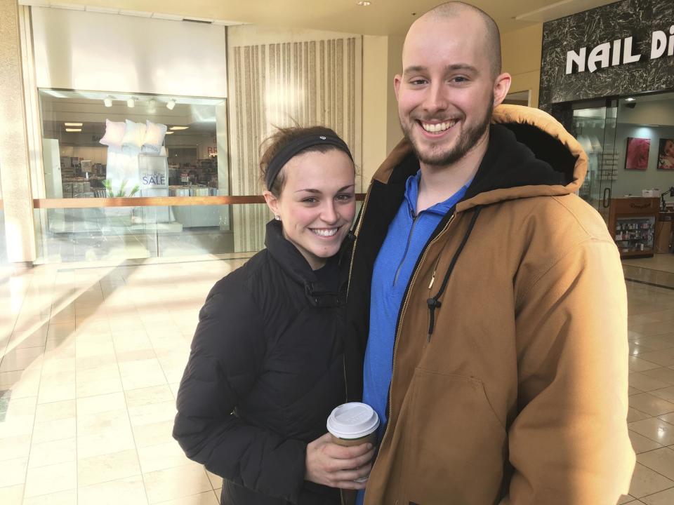 Courtney Taylor and her boyfriend, Zach Tobias, pose for a portrait at a mall in Whitehall, Pennsylvania, on Feb. 9, 2017. Taylor and Tobias don’t mix shopping with politics, but say it seems to be happening more often during the Donald Trump era as activists who either oppose or support the president target stores and brands for boycotts. (AP Photo/Michael Rubinkam)