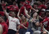 Chicago Bulls fans cheer during the first half of an NBA basketball play-in tournament game against the Atlanta Hawks in Chicago, Wednesday, April 17, 2024. (AP Photo/Nam Y. Huh)