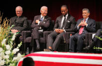 <p>Former Vice President Joe Biden (2nd L) speaks with Arizona Cardinals football player Larry Fitzgerald Jr. (2nd R) and Tommy Espinoza (R) as Father Edward Reese looks on at a memorial service for Senator John McCain at North Phoenix Baptist Church in Phoenix, Ariz.,, Aug. 30, 2018. (Photo: Brian Snyder/Reuters) </p>