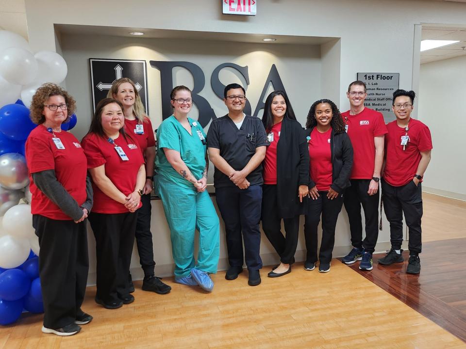 BSA Center for Advanced Therapeutic Endoscopy staff pose for a photo, marking the opening of the new state-of-the-art facility during a Thursday afternoon ribbon cutting.