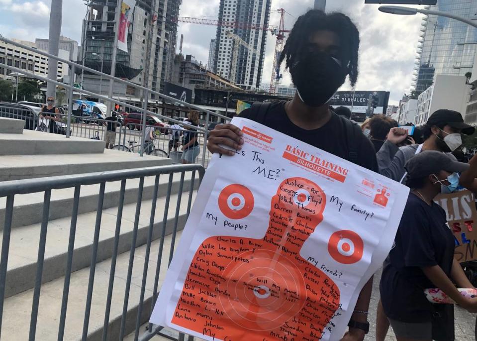 Angel Severin, 22, is a student at Miami Dade College who attended a third day of protests Monday afternoon in downtown Miami. Severin said that while he’s been scared in the past he felt safe among the crowd.