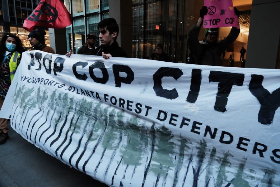 NEW YORK, NEW YORK – MARCH 09: Activists participate in a protest against the proposed Cop City being built in an Atlanta forest on March 09, 2023 in New York City. Cop City, a vast police training facility under construction atop forestland in the Atlanta, Georgia area, has become a focus point of demonstrations opposed to the development in one of the state’s most pristine forests. The $90 million training center is designed to train police in militarized urban warfare. (Photo by Spencer Platt/Getty Images)