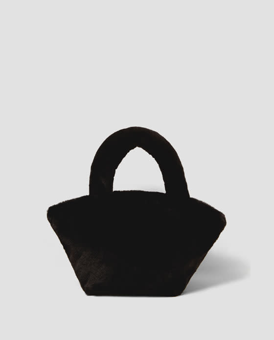 <p>We didn’t know that we needed a faux fur bag until Zara told us we did. This 90s-inspired accessory sits at the top of our shopping lists.<br><em><a rel="nofollow noopener" href="https://www.zara.com/uk/en/woman/accessories/view-all/textured-mini-handbag-c733915p4781564.html" target="_blank" data-ylk="slk:Zara;elm:context_link;itc:0;sec:content-canvas" class="link ">Zara</a>, £19.99</em> </p>