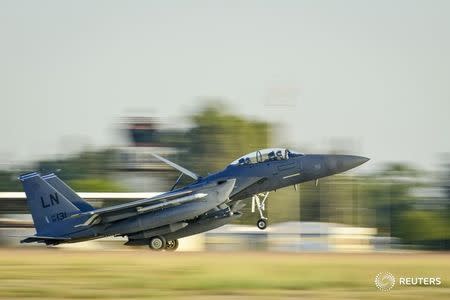 A U.S. Air Force F-15E Strike Eagle from the 48th Fighter Wing lands at Incirlik Air Base, Turkey, November 12, 2015. REUTERS/USAF/Airman 1st Class Cory W. Bush/Handout via Reuters