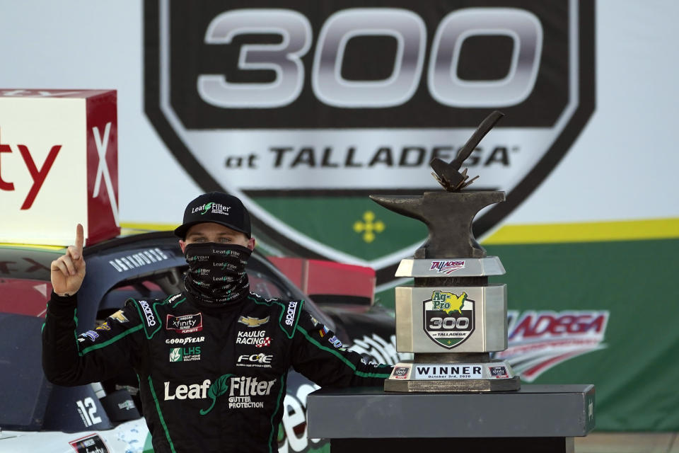 Justin Haley celebrates in Victory Lane after winning a NASCAR Xfinity Series auto race at Talladega Superspeedway, Saturday, Oct. 3, 2020, in Talladega, Ala. (AP Photo/John Bazemore)